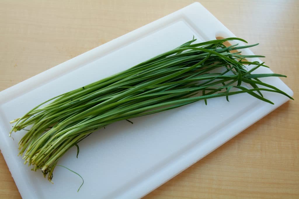 Fresh chives on a cutting board