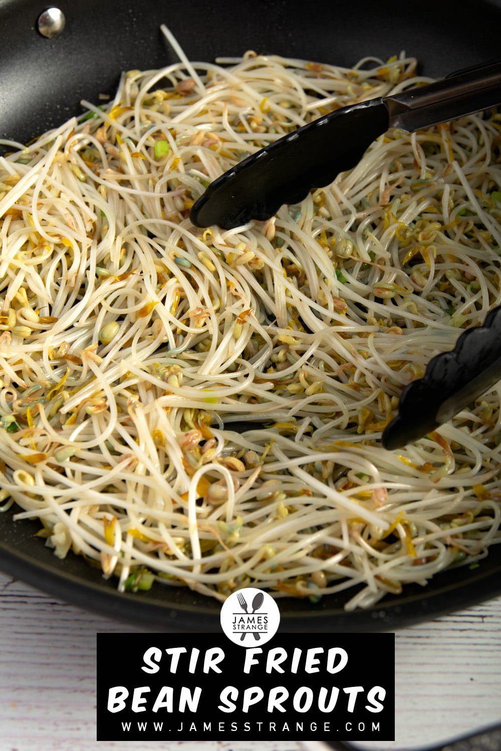 Finished dish of stir fried bean sprouts in a pan. This is a pin for Pinterest