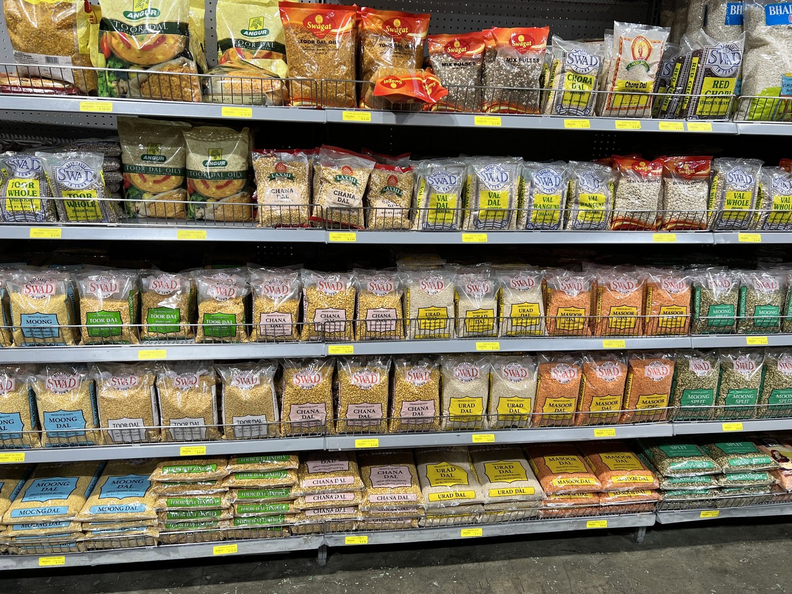 Store shelf with various types of dal