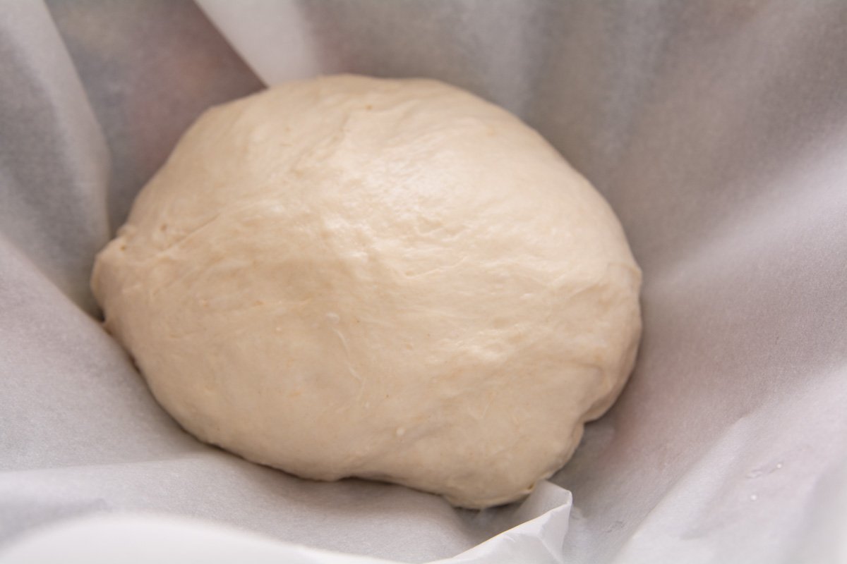 Dough stretched and formed into a ball