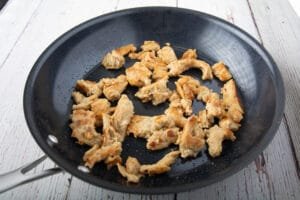 Lightly browned seitan in a pan