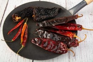 Dried chili peppers on a flat pan