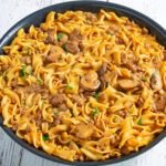 Vegan stroganoff in a pan on a table