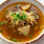 Photo of beef and radish soup in a bowl.