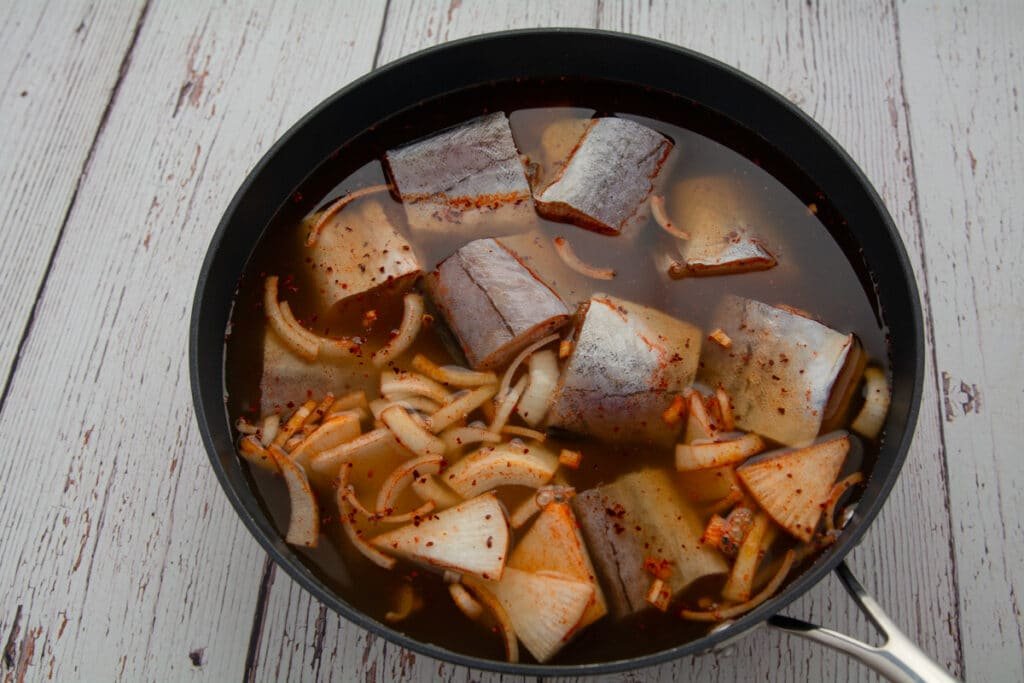 Fish, radish and onion in the veggie broth