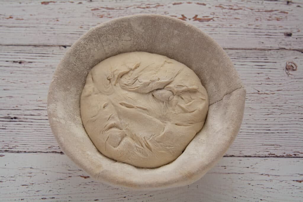 Dough in a basket ready to rise.