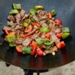 Finished pepper steak in a wok
