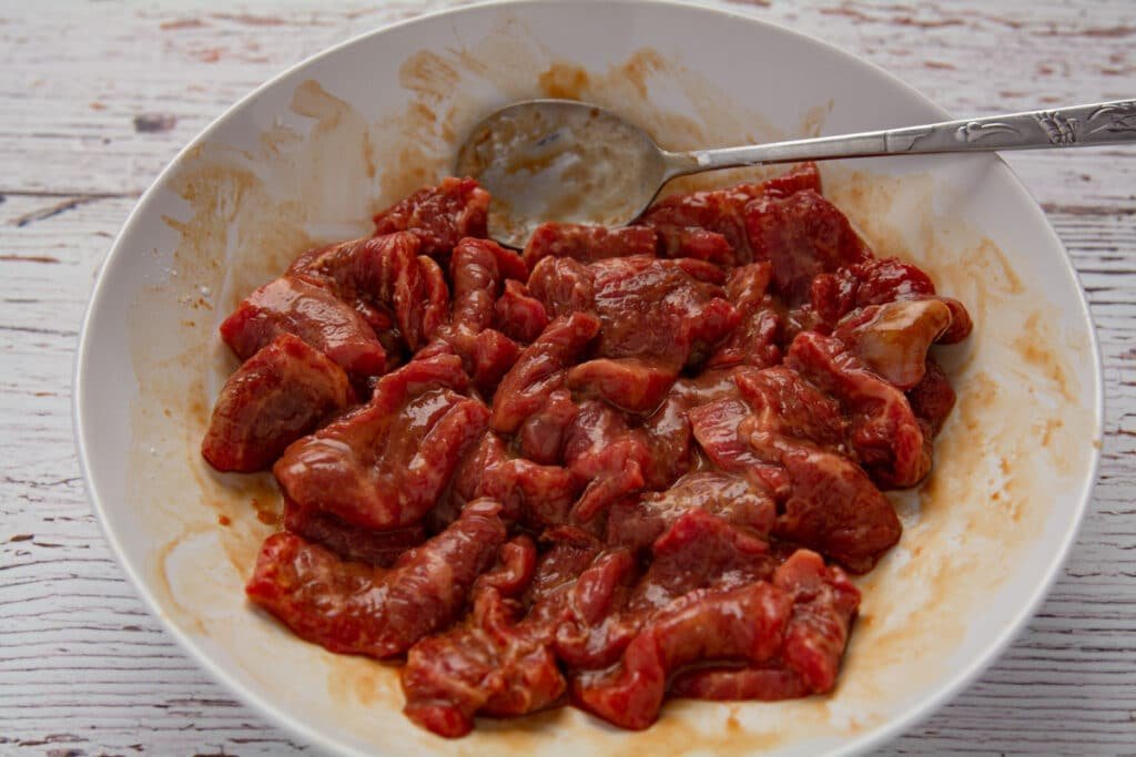 Slices of steak marinating