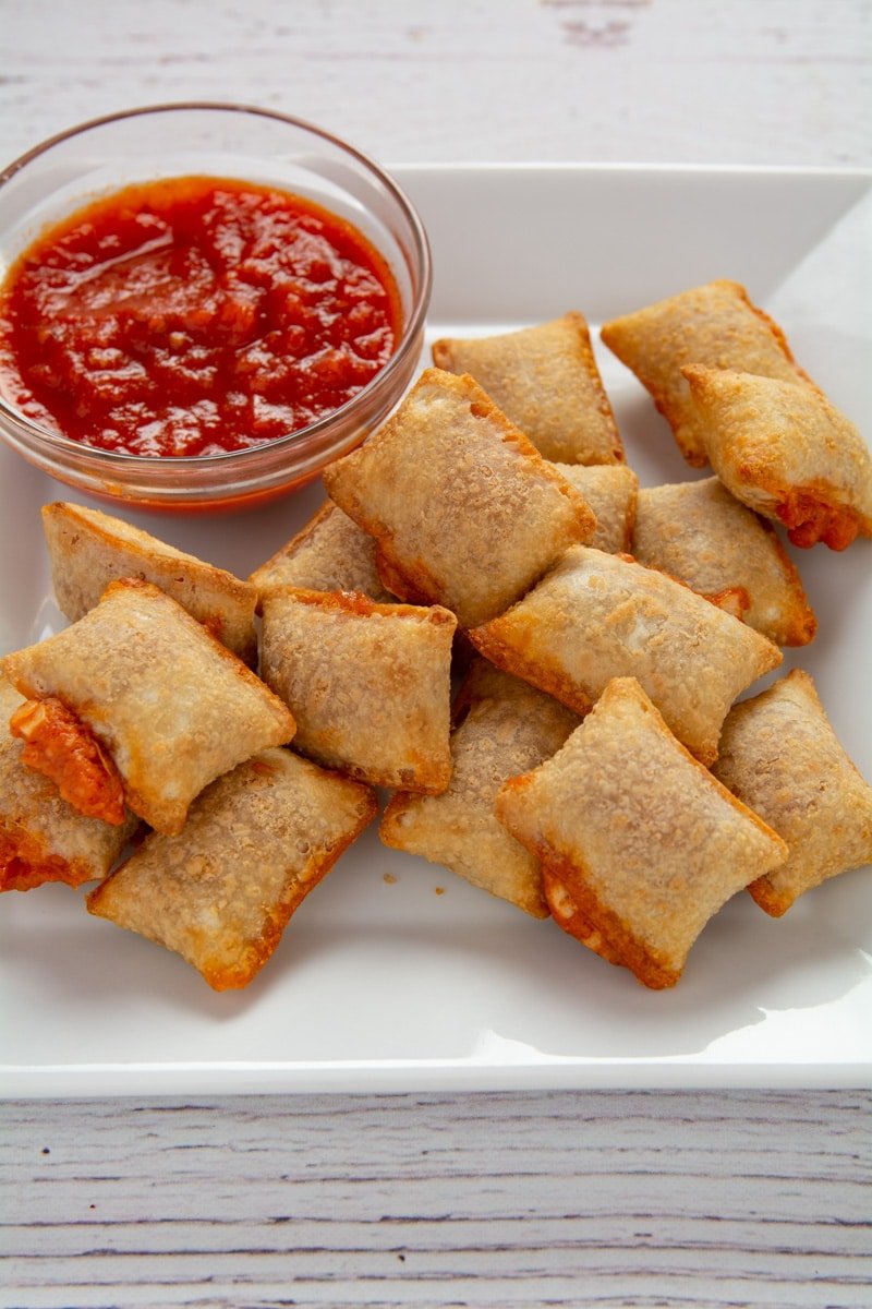 Air fried pizza rolls with lots of blowouts