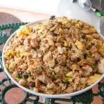 Chicken and veggie fried rice in a bowl.