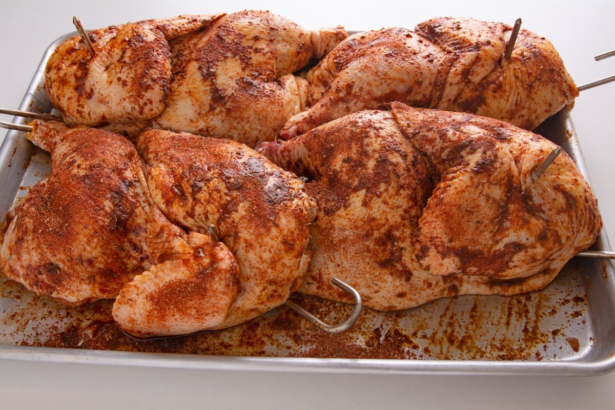 Seasoned chicken on a tray