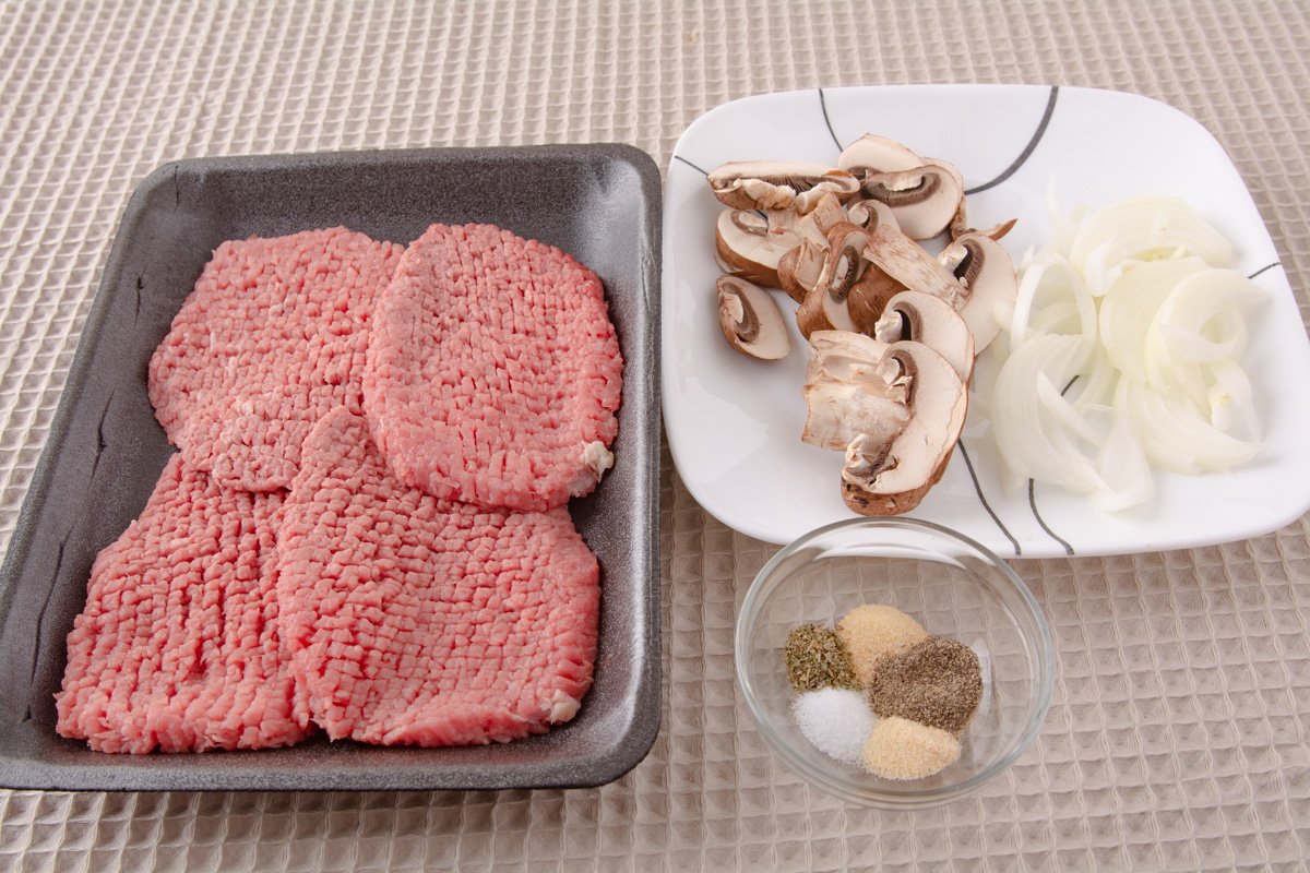 Ingredients for cube steak and gravy on a table