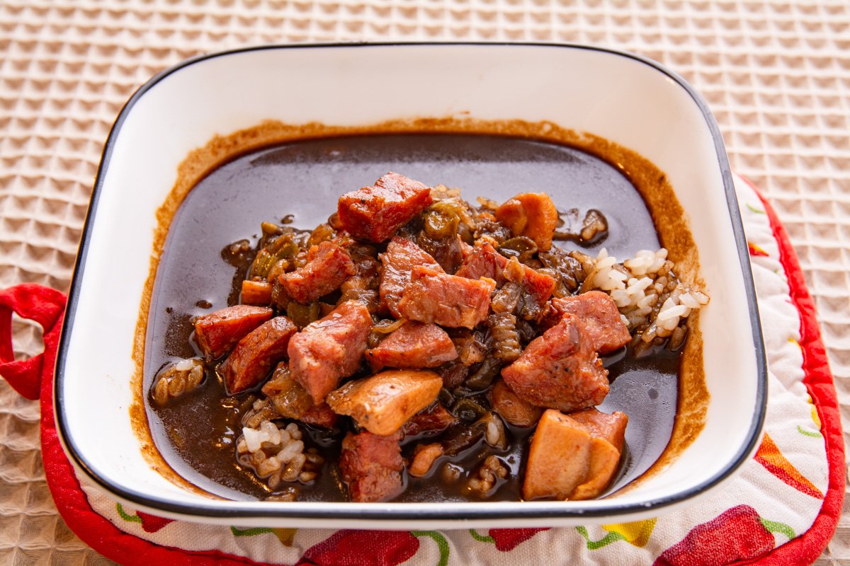 bowl of rice and gumbo on a table